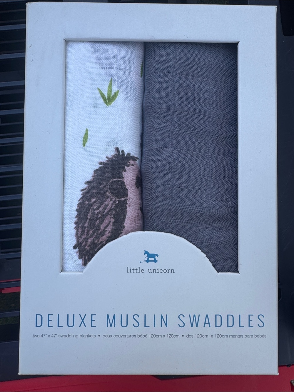 Little Unicorn Deluxe Muslin Swaddle 2-Pack in the "Charcoal Hedgehog" design.